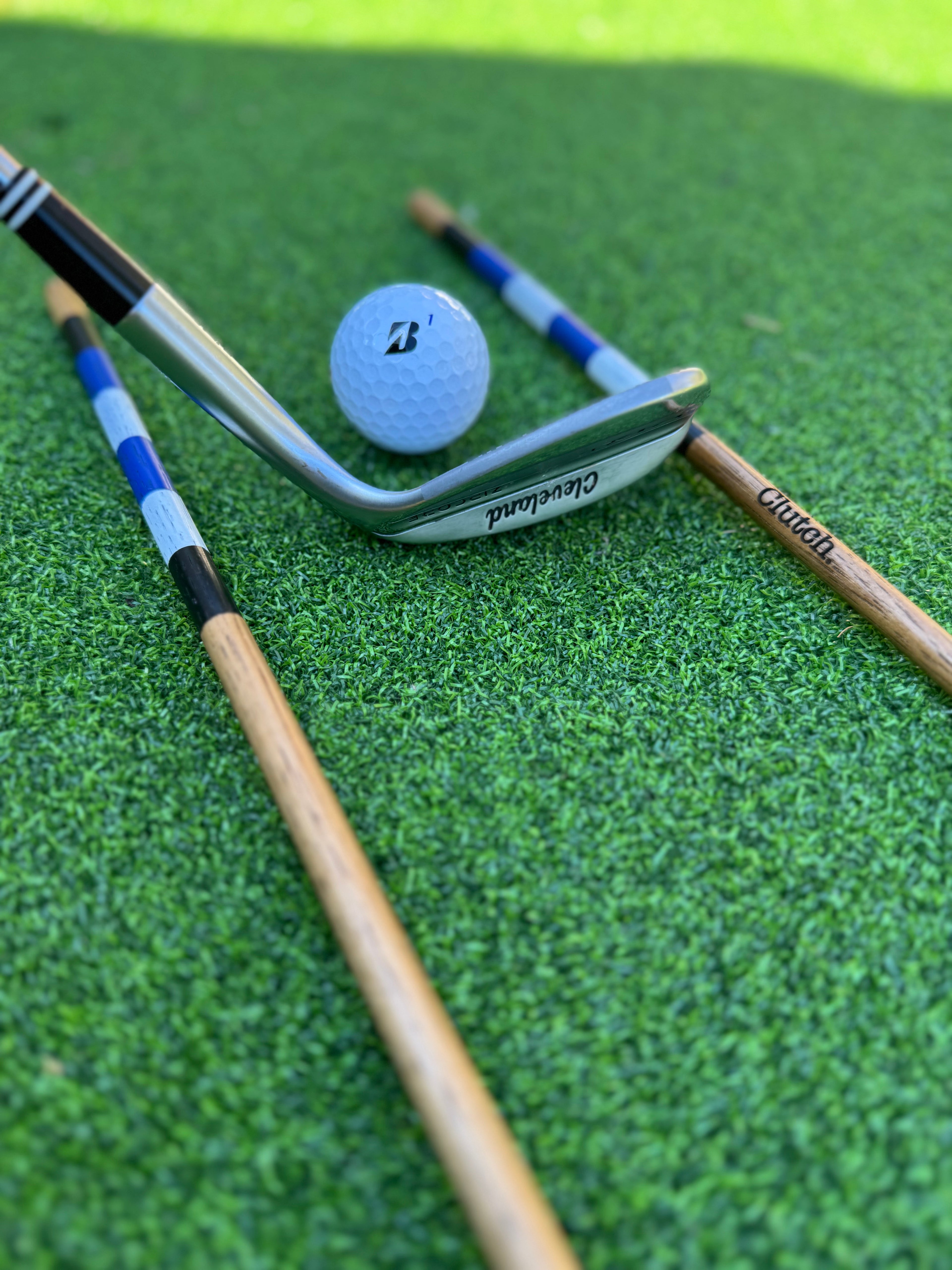 two golf alignment sticks